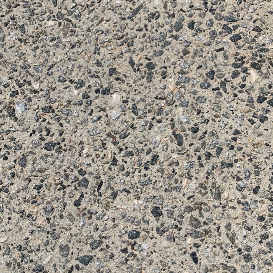 Close detail of an exposed aggregate concrete surface