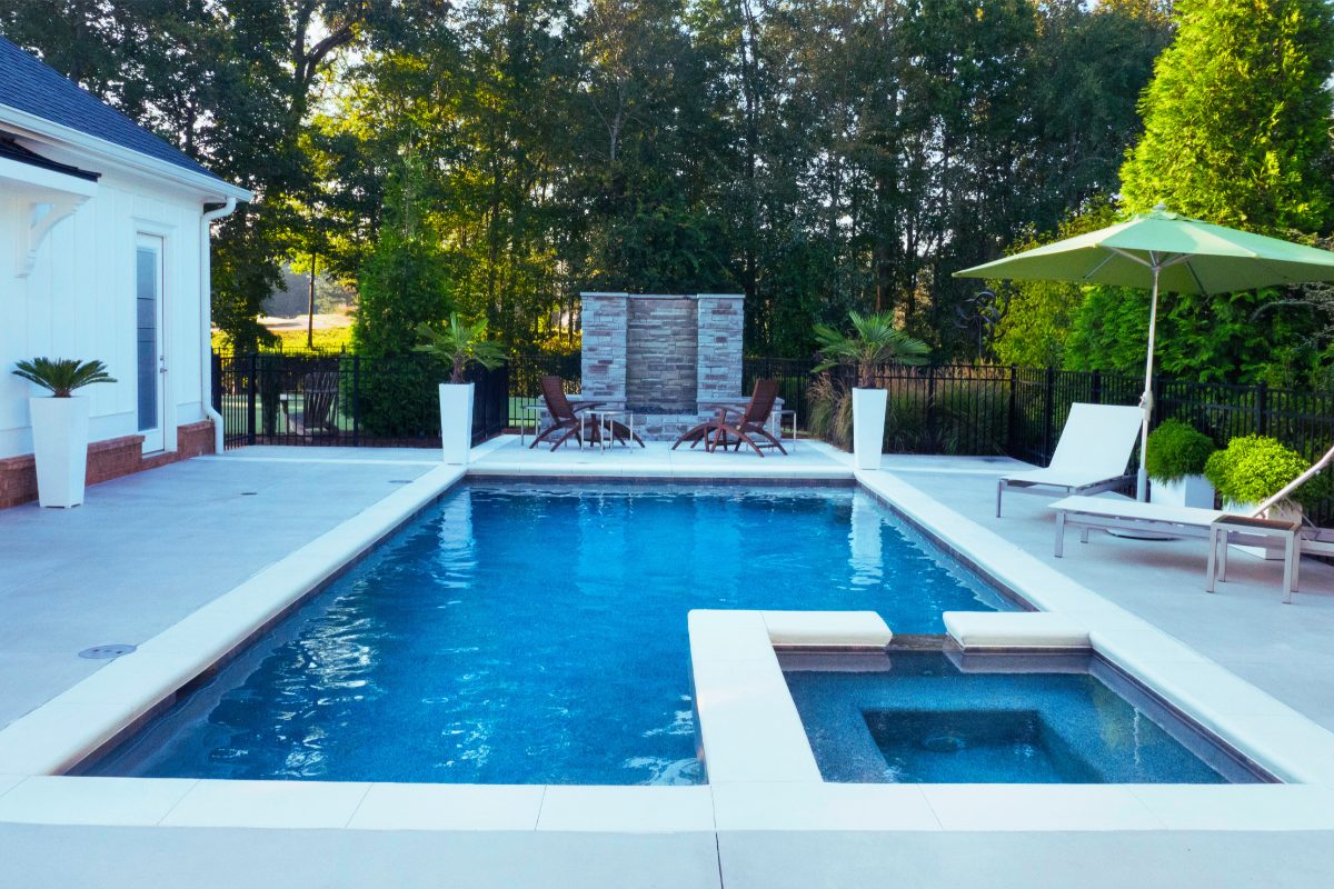 Plain grey concrete pool surround in Ashwood